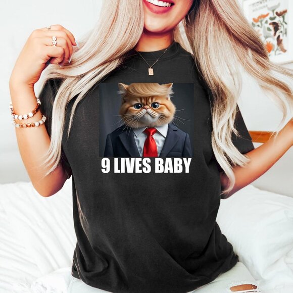 Nine Lives Baby Shirt Funny Trump Cat 9 Lives T Shirt Political Satire Gift Let - Picture 1 of 2